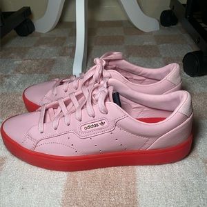 Adidas women’s sleek “Diva pink” sneakers.